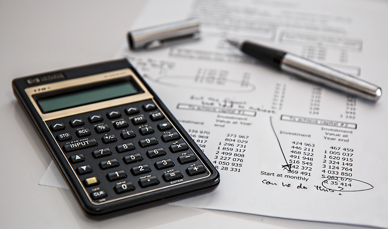 Person reviewing numbers related to credit score and loan readiness